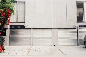 An image showcasing seven different materials for insulating garage doors